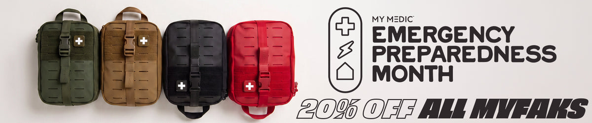 Four emergency preparedness backpacks in olive green, tan, black, and red are lined up against a white background, next to promotional text for 'My Medic Emergency Preparedness Month' and a 20% off all MVAKAs sale.