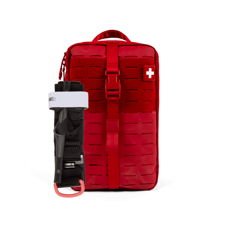A red tactical first aid kit pouch with a quick-release buckle and a white cross symbol on the front, shown alongside a black and white tourniquet on a solid white background.
