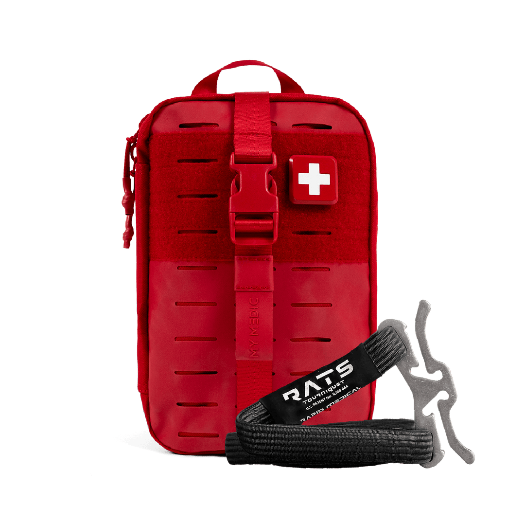 A red emergency first aid kit pouch with a white cross patch on the front, shown on a white background with a black rats tq.